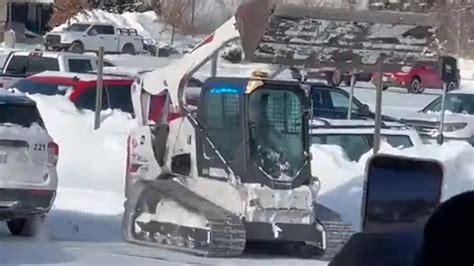 skid steer vs police|'On a rampage': Video shows Nebraska man slam Bobcat into .